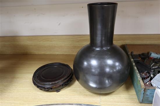 A Japanese bronze vase on associated hardwood stand height 32cm excluding stand